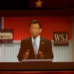 Republican U.S. presidential candidate Jindal is seen on a video monitor during a forum for lower polling candidates held by Fox Business Network before the U.S. Republican presidential candidates debate in Milwaukee
