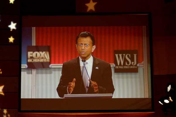 Republican U.S. presidential candidate Jindal is seen on a video monitor during a forum for lower polling candidates held by Fox Business Network before the U.S. Republican presidential candidates debate in Milwaukee