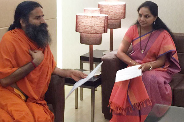 Baba Ramdev, wooed both by Andhra and Telangana