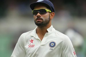 Kohli sneaks risky single to bring up 13th test century