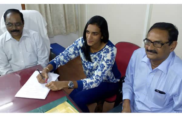 P V Sindhu takes charge as Deputy Collector