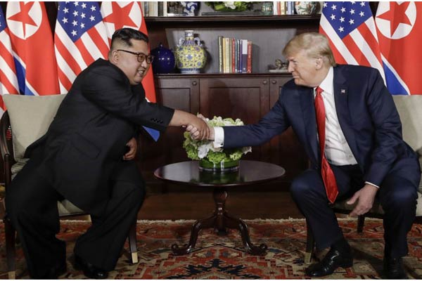 Trump, Kim begin summit meeting in Singapore