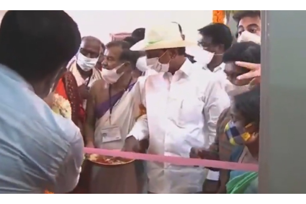 With scissors not available, KCR pulls off ribbon