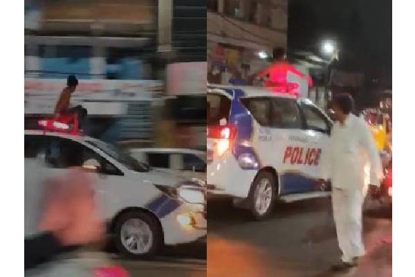 Drunk man hops on to moving police vehicle in Hyderabad