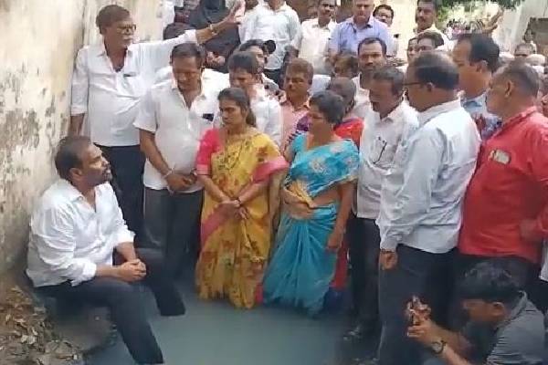 Andhra’s ruling party MLA enters drain in novel protest