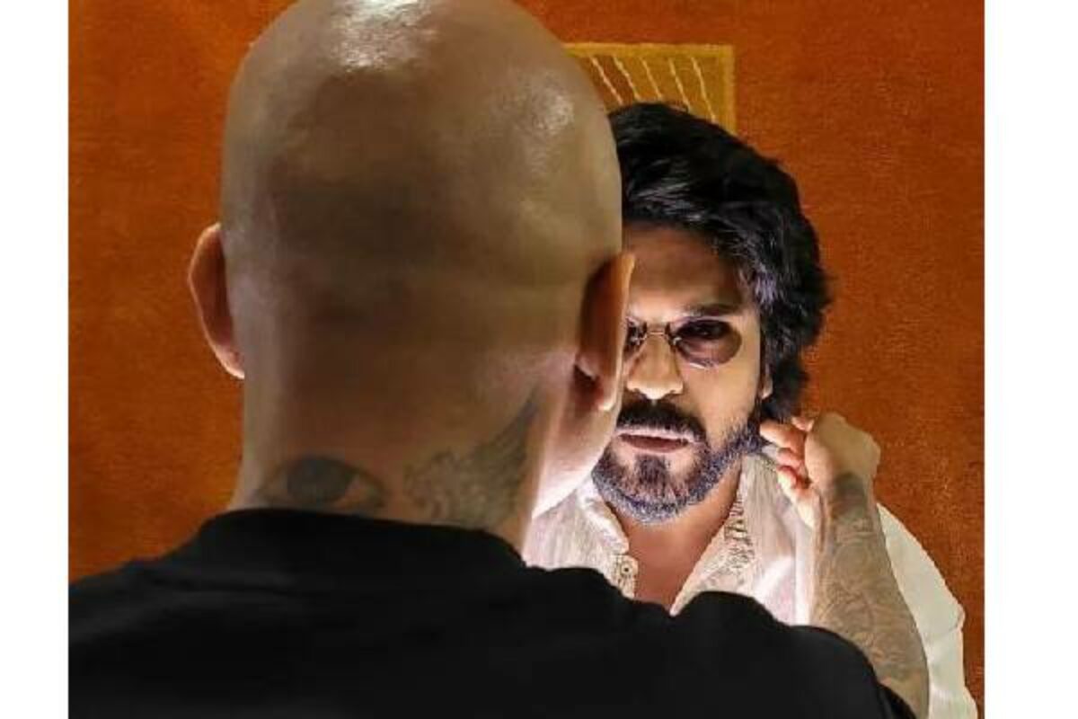 Ram Charan flaunting his new hairstyle goes viral Ram Charan flaunting his new hairstyle goes viral