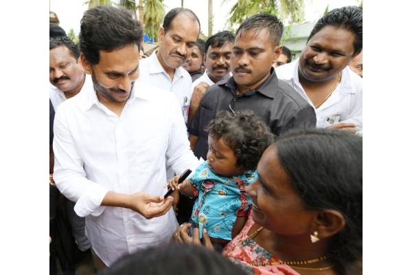Jagan gifts his pen to an eight-months old child