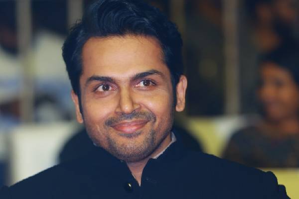 Karthi responds about PS1 compared to Baahubali