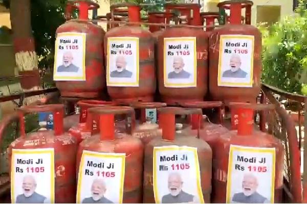 TRS hits back at FM with PM’s pictures on LPG cylinders