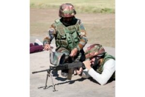 Vijay Deverakonda shoots with a rifle along with a jawan