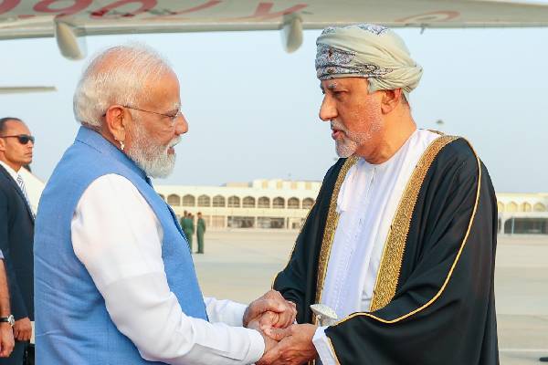 Viral: PM Modi’s Earpiece Sparks Curiosity During Oman Visit
